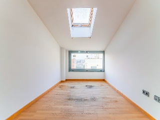 Promoción de viviendas con garajes y trasteros en Bell-lloc d´Urgell 35
