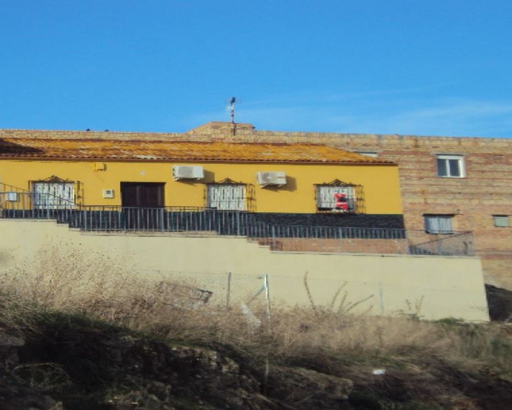 Casa adosada en C/ Rodrigo de Triana, Aznalcóllar (Sevilla)