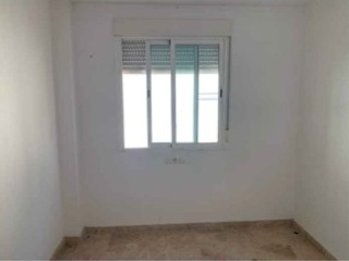 Piso y plazas de garaje en C/ Virgen de la Cabeza 6