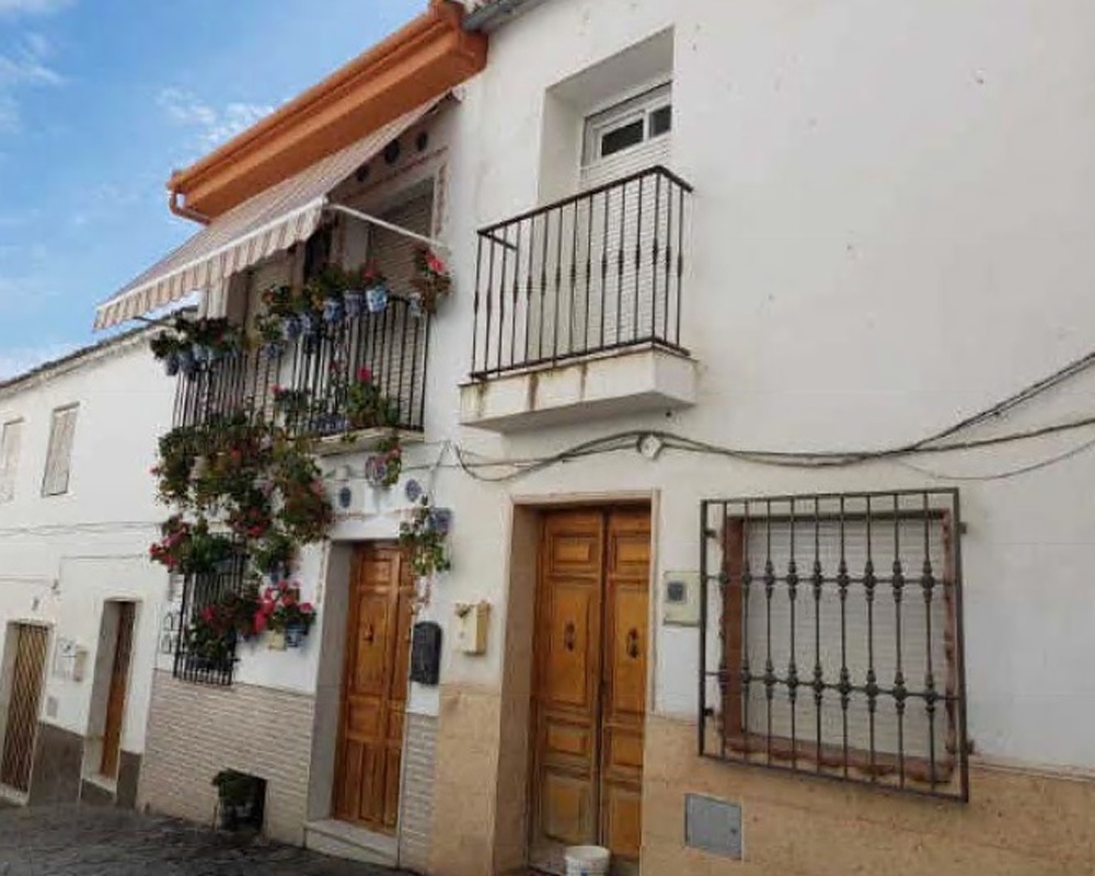 Casa adosada en C/ Cantera, Algarinejo (Granada)
