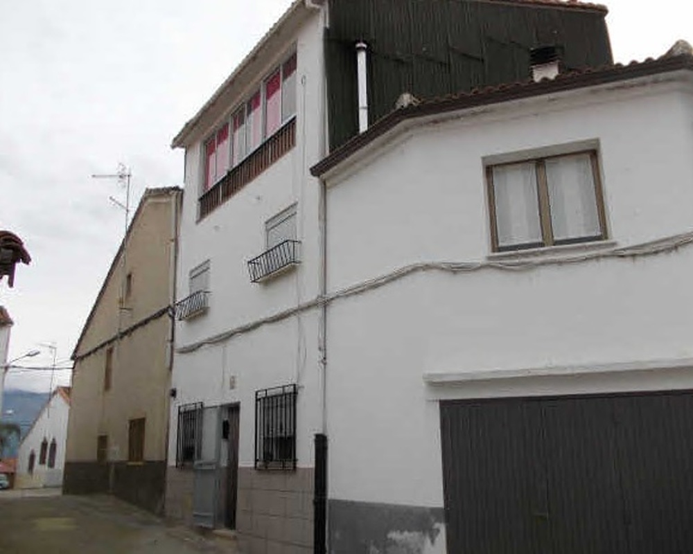 Casa adosada en C/ Pozo de la Huerta, Zarza de Granadilla (Cáceres)